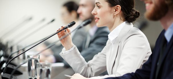 Panel talking to an audience