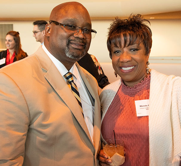 a couple attending a business event