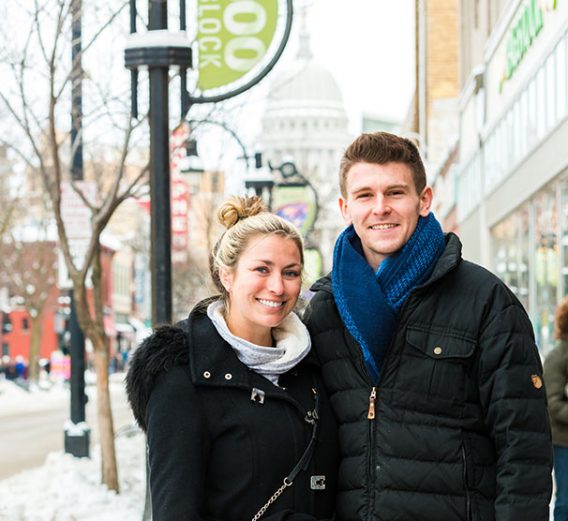 two individuals shopping in downtown Madison