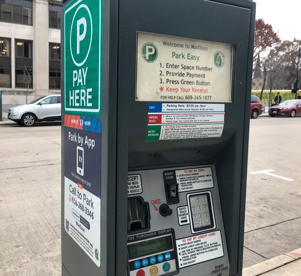 a parking meter on a city street