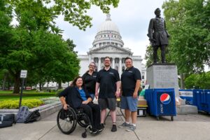 Accessibility services image of event evaluators in front of Wisconsin State Capitol