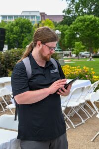 Accessibility services image of person evaluating an event